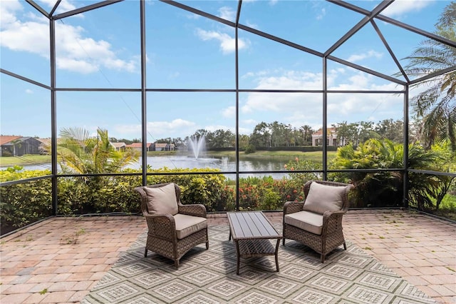 6519 43rd Ct E, Sarasota, FL 34243 - view of patio with a lanai, a water view, and outdoor lounge area
