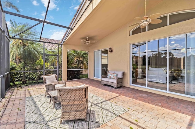 6519 43rd Ct E, Sarasota, FL 34243 - view of patio / terrace featuring ceiling fan and a lanai