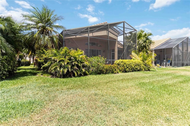 6519 43rd Ct E, Sarasota, FL 34243 - view of yard featuring a lanai