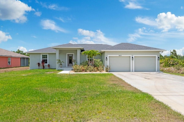view of front of house with a garage, a front lawn, stucco siding, and driveway