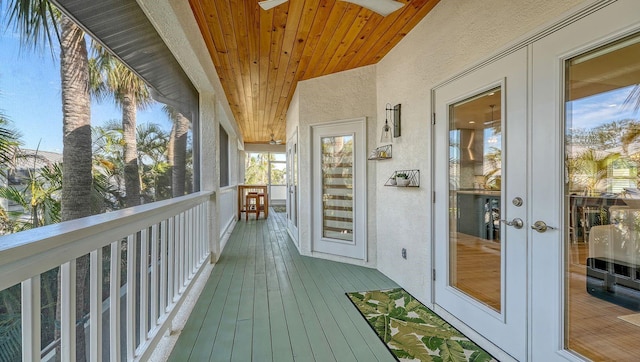 345 Madison Dr, Sarasota, FL 34236 - wooden terrace featuring french doors