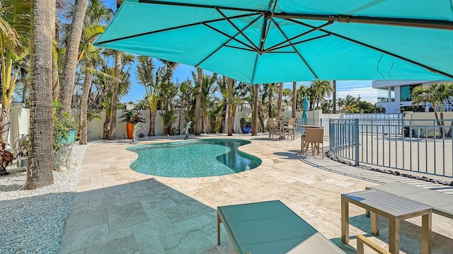 345 Madison Dr, Sarasota, FL 34236 - view of swimming pool with a fenced in pool, a fenced backyard, and a patio area