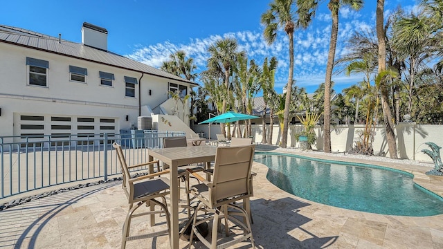 345 Madison Dr, Sarasota, FL 34236 - view of swimming pool featuring a fenced backyard, a fenced in pool, a patio, and stairway
