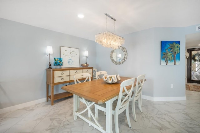 dining room featuring visible vents, baseboards, an inviting chandelier, and marble finish floor