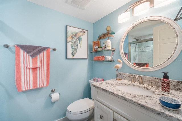 full bath with an enclosed shower, vanity, toilet, and visible vents