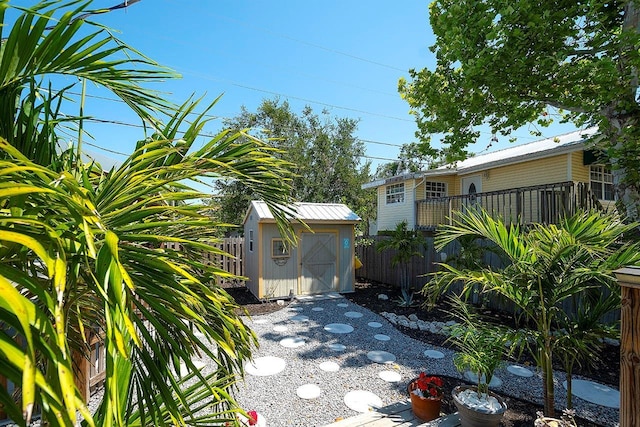 1814 6th Ave W, Bradenton, FL 34205 - view of patio / terrace featuring an outbuilding, a shed, and a fenced backyard