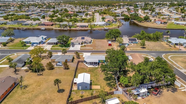 aerial view featuring a residential view and a water view