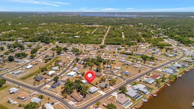 aerial view with a residential view and a water view