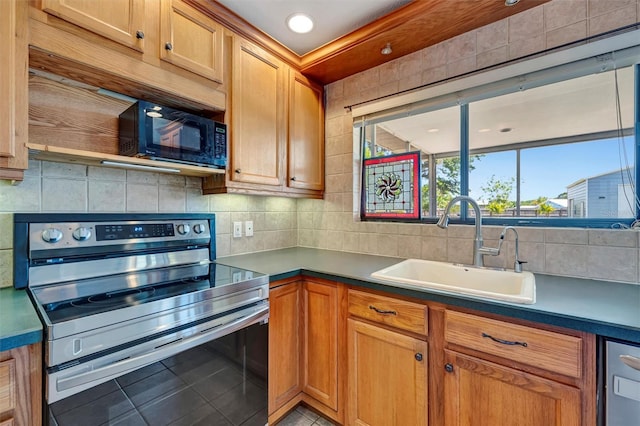 kitchen with recessed lighting, a sink, stainless steel appliances, light tile patterned flooring, and tasteful backsplash