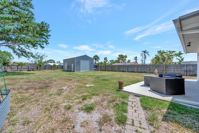 view of yard featuring an outdoor structure, a storage unit, a fenced backyard, and a patio area