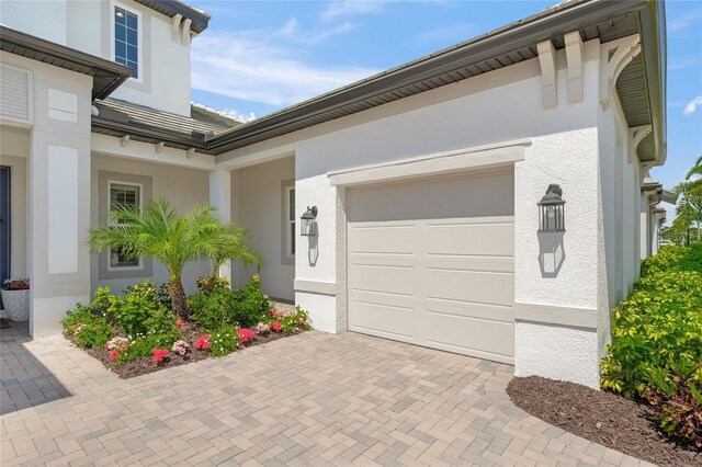 exterior space with decorative driveway