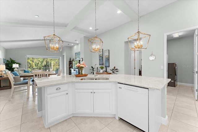 kitchen with light tile patterned flooring, a notable chandelier, a sink, dishwasher, and open floor plan