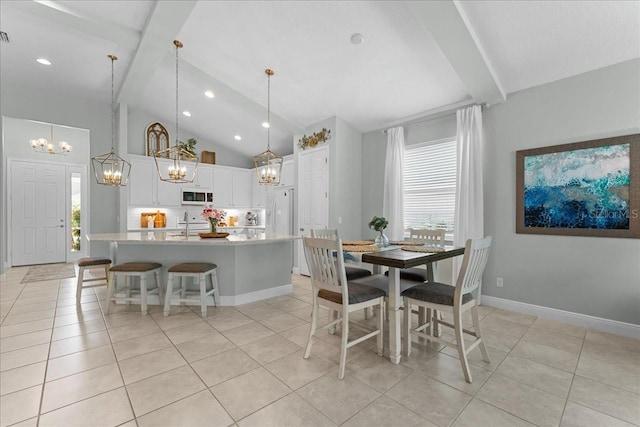 dining room featuring light tile patterned floors, baseboards, beamed ceiling, and a chandelier