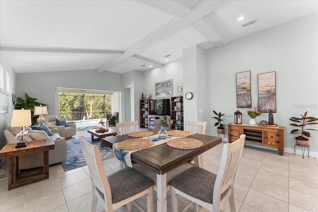 dining space featuring light tile patterned floors, visible vents, and a healthy amount of sunlight
