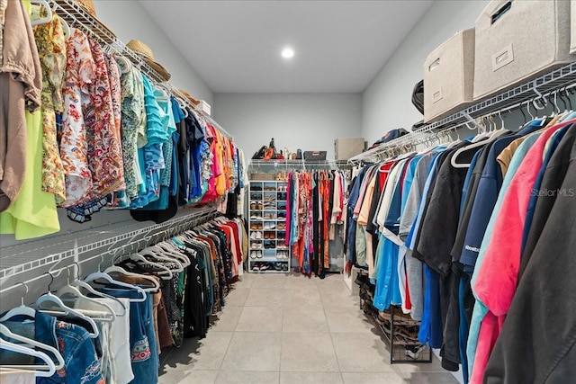spacious closet with tile patterned flooring