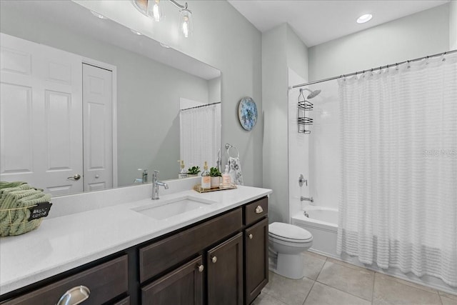 full bath with vanity, tile patterned flooring, toilet, and shower / tub combo with curtain