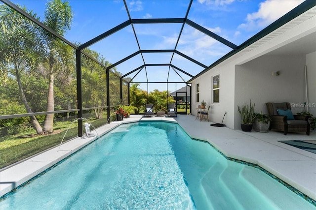 outdoor pool with a patio area