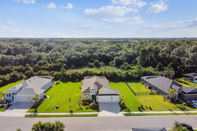 4515 Roycroft Ter, Parrish, FL 34219 - aerial view of residential area with a forest