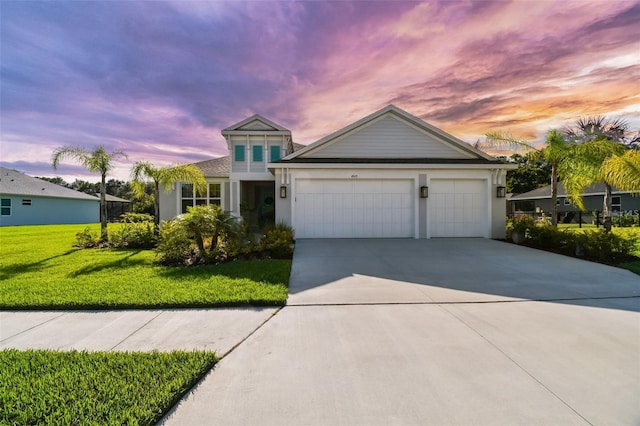 4515 Roycroft Ter, Parrish, FL 34219 - view of front of house featuring driveway, an attached garage, a front yard, and stucco siding