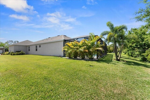 4515 Roycroft Ter, Parrish, FL 34219 - view of grassy yard with a lanai
