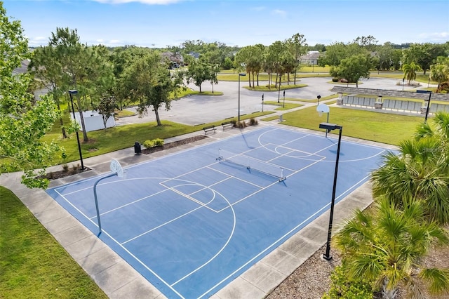 4515 Roycroft Ter, Parrish, FL 34219 - view of basketball court featuring community basketball court, a yard, and view of wooded area