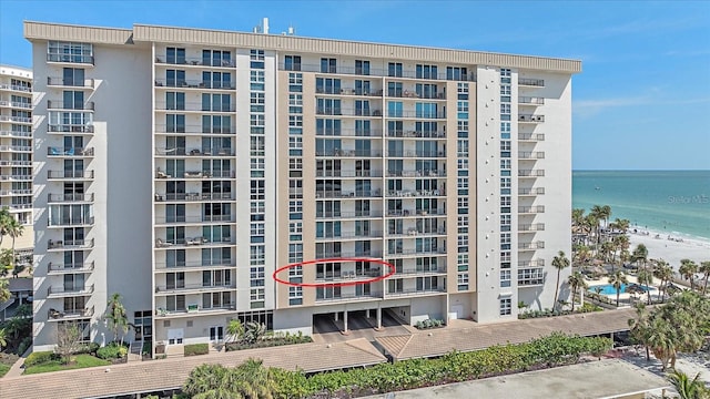 1212 Benjamin Franklin Dr Unit 306, Sarasota, FL 34236 - view of apartment building / complex with a water view