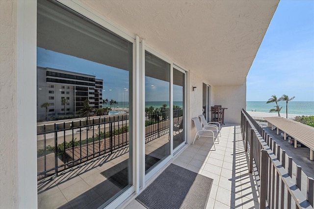 1212 Benjamin Franklin Dr Unit 306, Sarasota, FL 34236 - balcony with view of water and beach