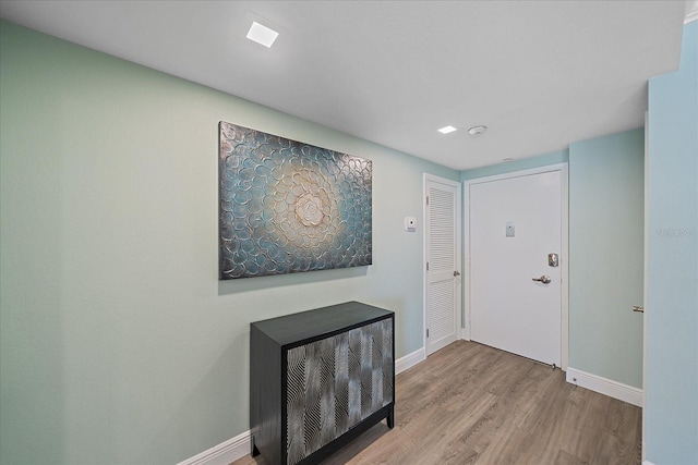 1212 Benjamin Franklin Dr Unit 306, Sarasota, FL 34236 - entryway featuring wood finished floors and baseboards