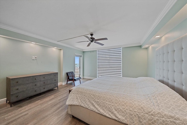 1212 Benjamin Franklin Dr Unit 306, Sarasota, FL 34236 - bedroom with wood finished floors, baseboards, ornamental molding, and a ceiling fan