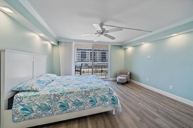 1212 Benjamin Franklin Dr Unit 306, Sarasota, FL 34236 - bedroom featuring ornamental molding, wood finished floors, access to exterior, baseboards, and a ceiling fan