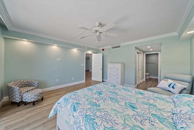 1212 Benjamin Franklin Dr Unit 306, Sarasota, FL 34236 - bedroom featuring light wood-style floors, ornamental molding, baseboards, ensuite bath, and ceiling fan