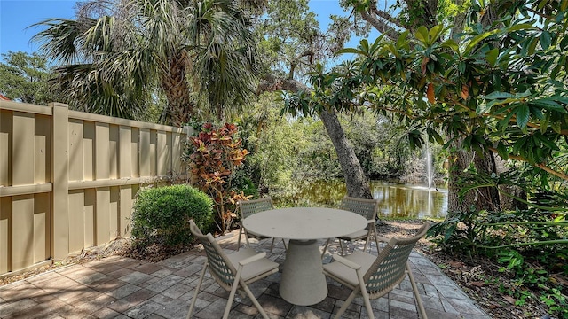 3605 Quail Hollow Ln, Bradenton, FL 34210 - view of patio / terrace with a water view and outdoor dining area