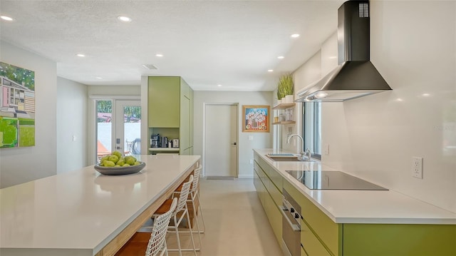 3605 Quail Hollow Ln, Bradenton, FL 34210 - kitchen featuring black electric stovetop, green cabinetry, ventilation hood, stainless steel oven, and recessed lighting