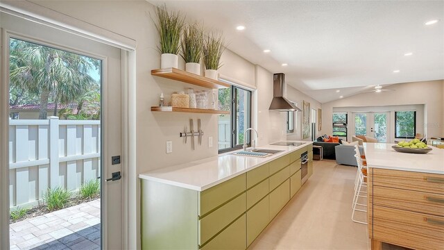 3605 Quail Hollow Ln, Bradenton, FL 34210 - kitchen featuring a ceiling fan, open floor plan, extractor fan, light countertops, and recessed lighting