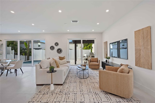 2590 Floyd St, Sarasota, FL 34239 - living area with recessed lighting and baseboards