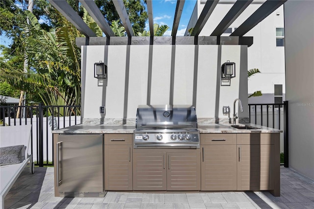 2590 Floyd St, Sarasota, FL 34239 - view of patio with a sink, area for grilling, grilling area, and fence