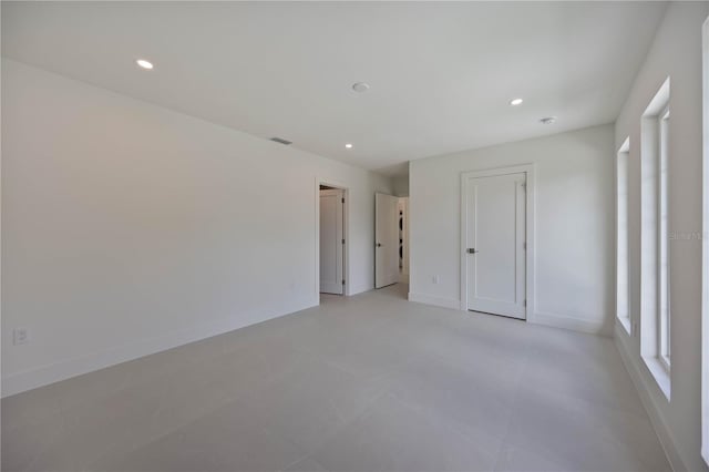 2590 Floyd St, Sarasota, FL 34239 - unfurnished bedroom featuring recessed lighting and baseboards