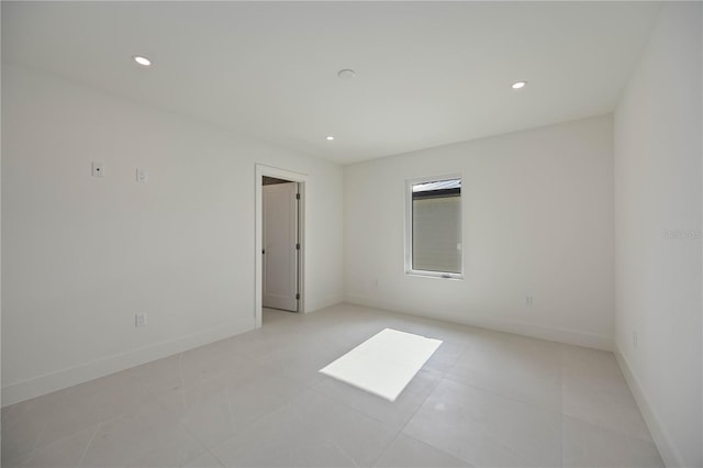 2590 Floyd St, Sarasota, FL 34239 - spare room featuring recessed lighting, baseboards, and light tile patterned flooring