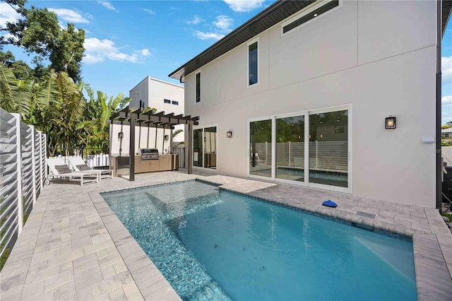 2590 Floyd St, Sarasota, FL 34239 - view of pool with area for grilling, a pergola, a patio, and fence