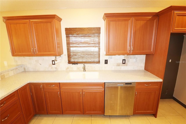 2521 Tamarind Dr, Edgewater, FL 32141 - kitchen featuring stainless steel dishwasher, a sink, light countertops, light tile patterned flooring, and backsplash