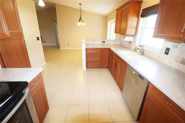 2521 Tamarind Dr, Edgewater, FL 32141 - kitchen with decorative backsplash, brown cabinetry, appliances with stainless steel finishes, a sink, and lofted ceiling