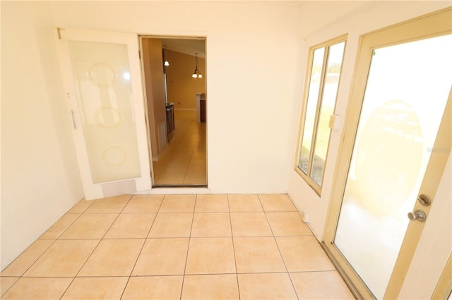 2521 Tamarind Dr, Edgewater, FL 32141 - hall with light tile patterned flooring and plenty of natural light