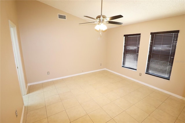 2521 Tamarind Dr, Edgewater, FL 32141 - unfurnished room featuring baseboards, visible vents, a ceiling fan, and lofted ceiling