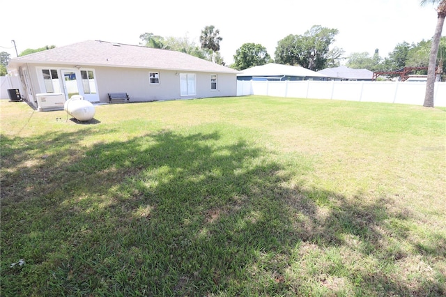 2521 Tamarind Dr, Edgewater, FL 32141 - view of yard with fence