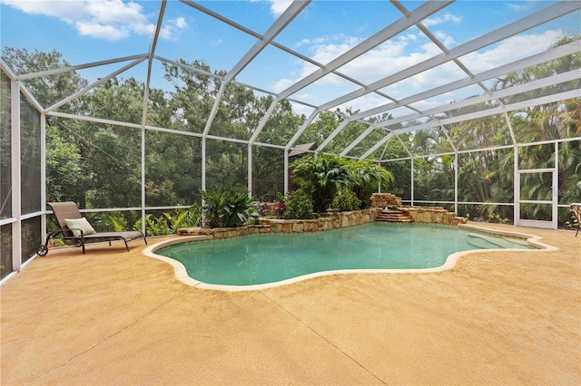 swimming pool featuring a patio and a lanai