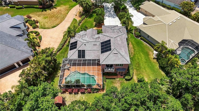 view of subject property with a pool area