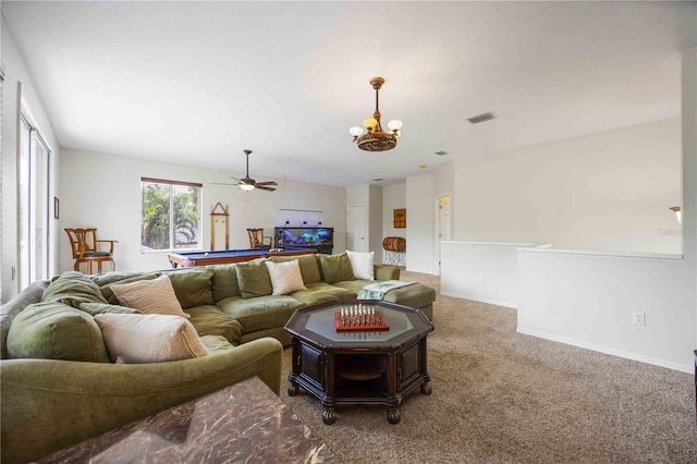 carpeted living area with pool table, a chandelier, ceiling fan, and baseboards