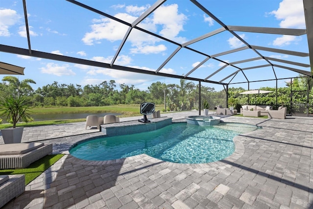 view of pool featuring an outdoor living space, a patio area, a water view, glass enclosure, and a pool with connected hot tub