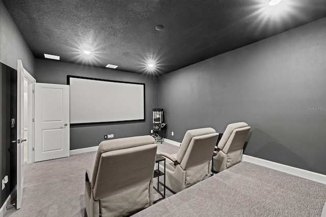 carpeted cinema with baseboards, recessed lighting, and a textured ceiling