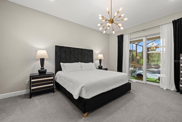 bedroom with carpet floors, access to outside, baseboards, and a notable chandelier